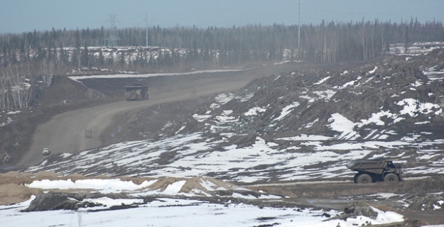 Weighing up to 60 tons each, the armada of dumpers in the mines make the normal vehicles look like toy cars.